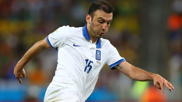 Greece star Vasilis Torosidis in action against Portugal in a friendly in 2014.