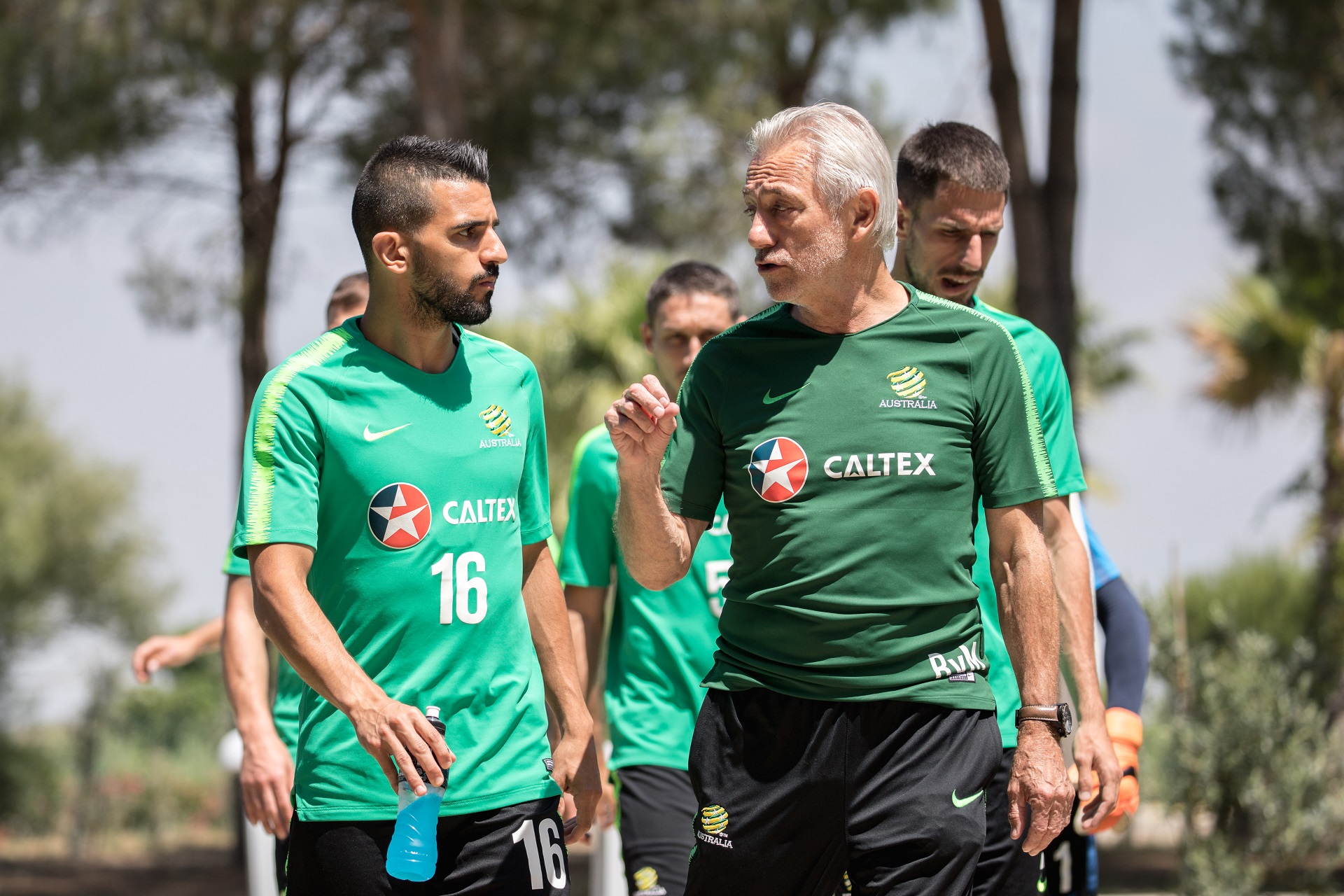 Bert van Marwijk speaks to Aziz Behich