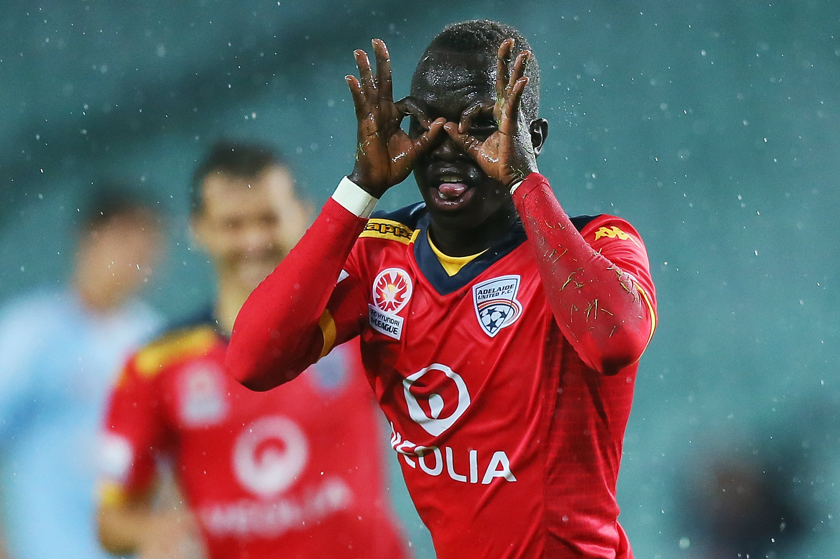 Awer Mabil celebrating a goal during his time at Adelaide United.