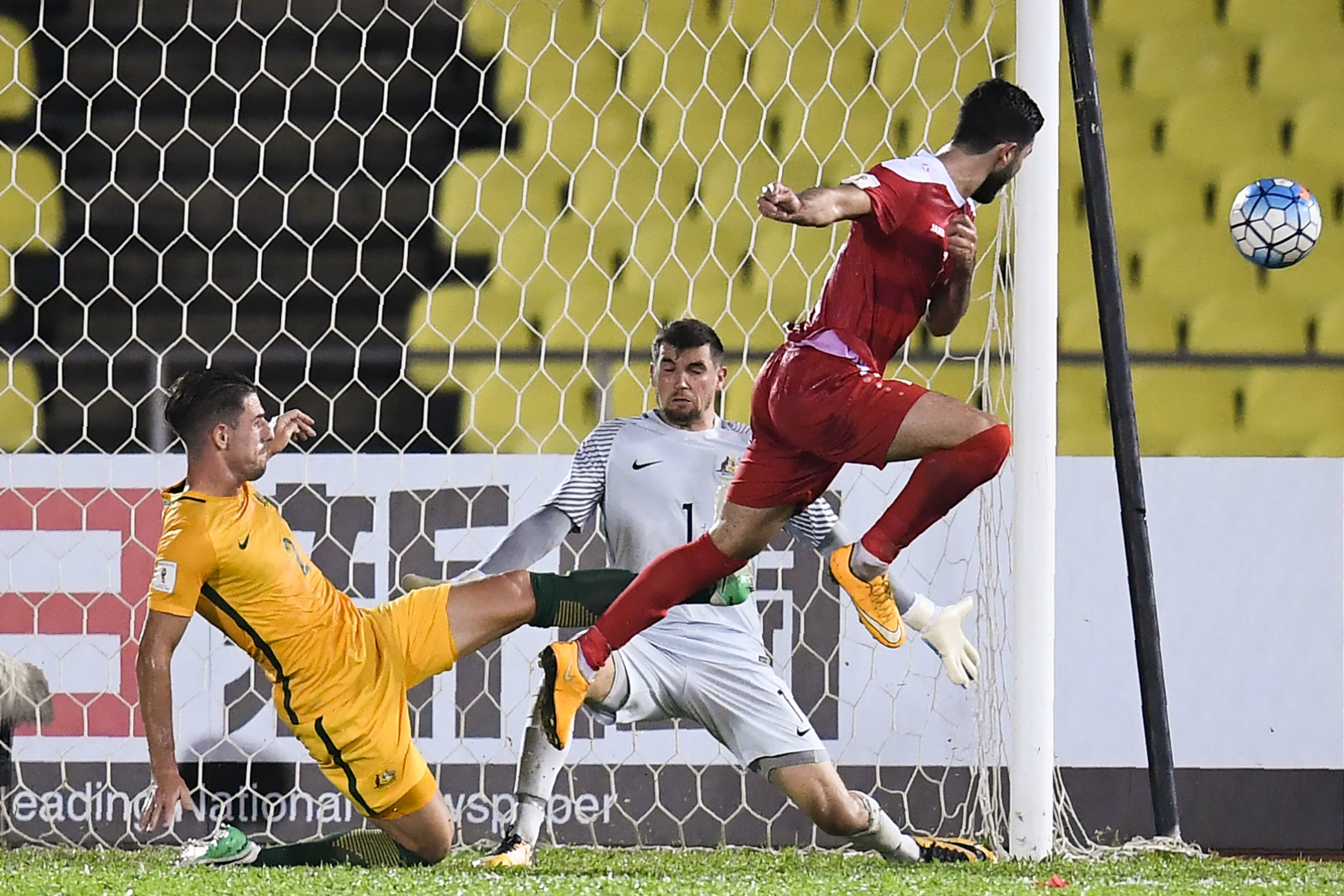 Milos Degenek makes a crucial challenge in the first leg.