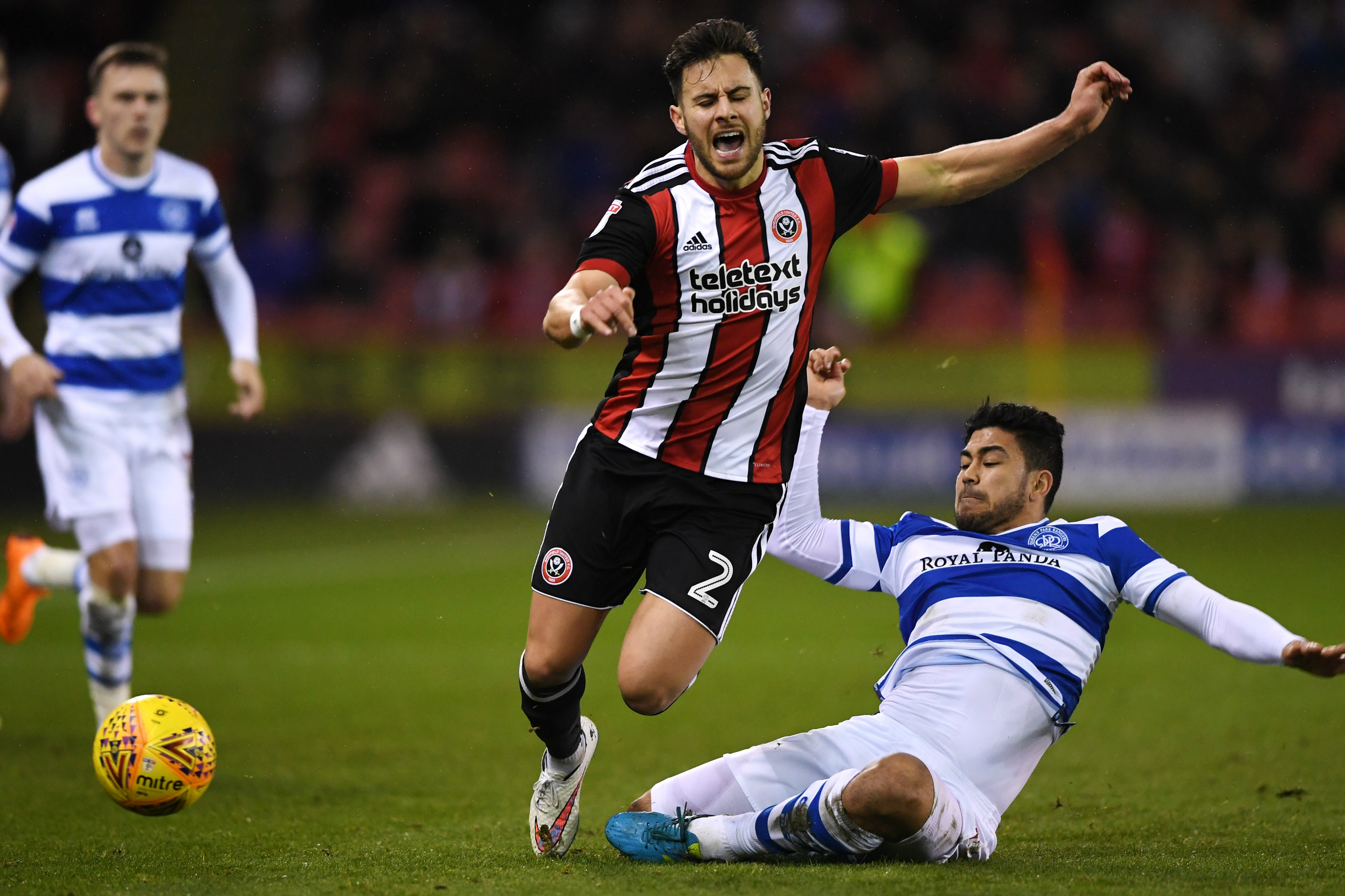 Massimo Luongo gets a tackle in on his Sheffield United opponent. Massimo Luongo gets a tackle in on his Sheffield United opponent.