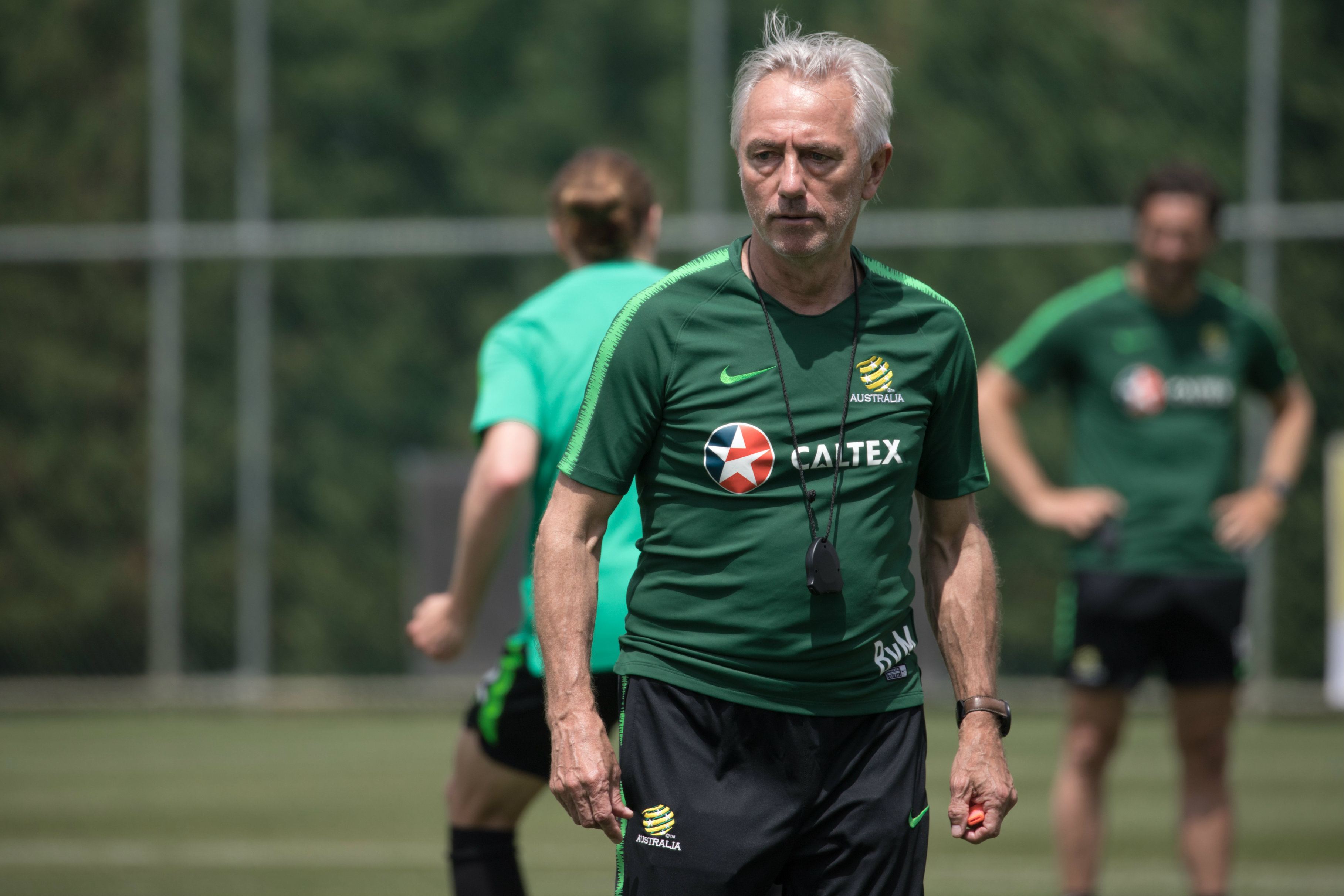 Caltex Socceroos boss Bert van Marwijk keeps a close eye on the session.
