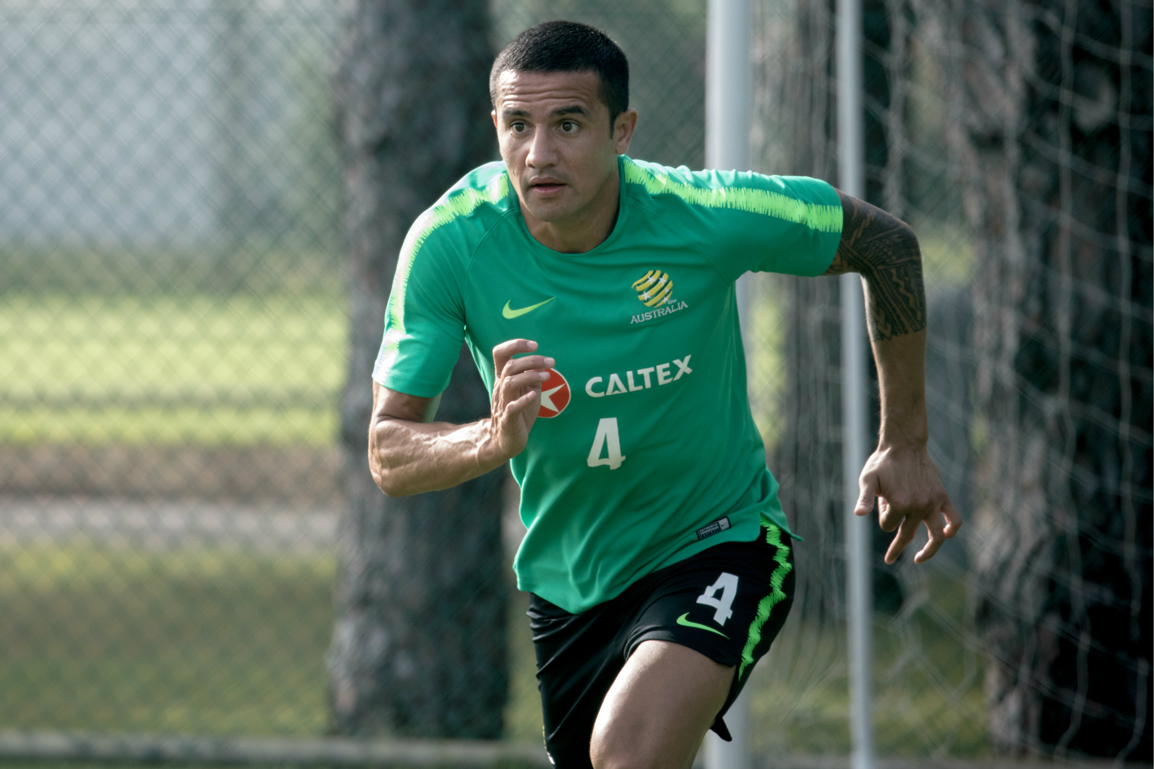Tim Cahill strides out. Tim Cahill strides out.