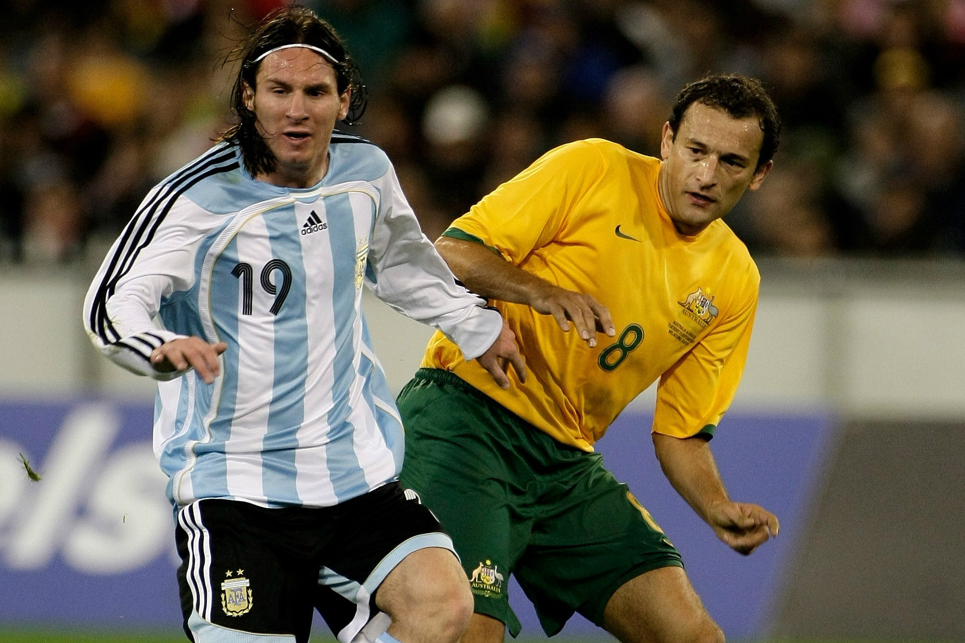 Josip Skoko up against Argentina superstar Lionel Messi.