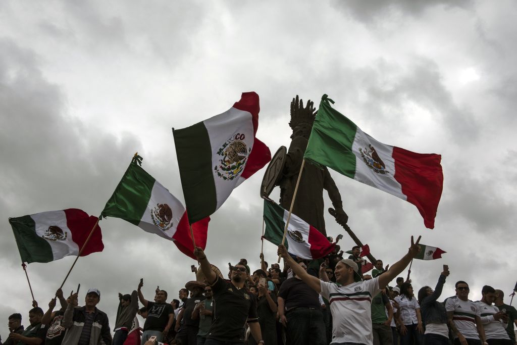 Mexico fans celebrate their win against Germany Mexico fans celebrate their win against Germany