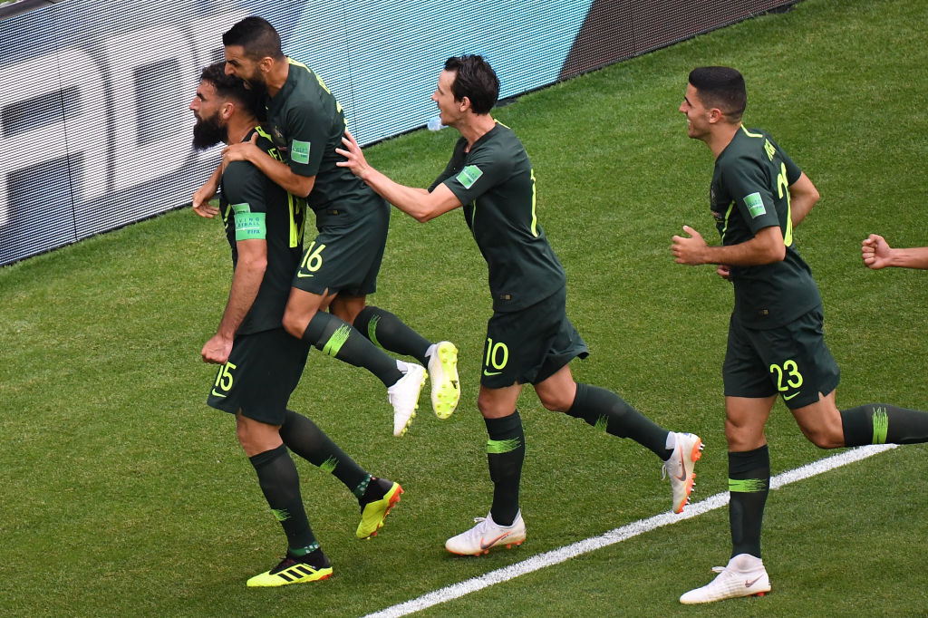 Mile Jedinak celebrates