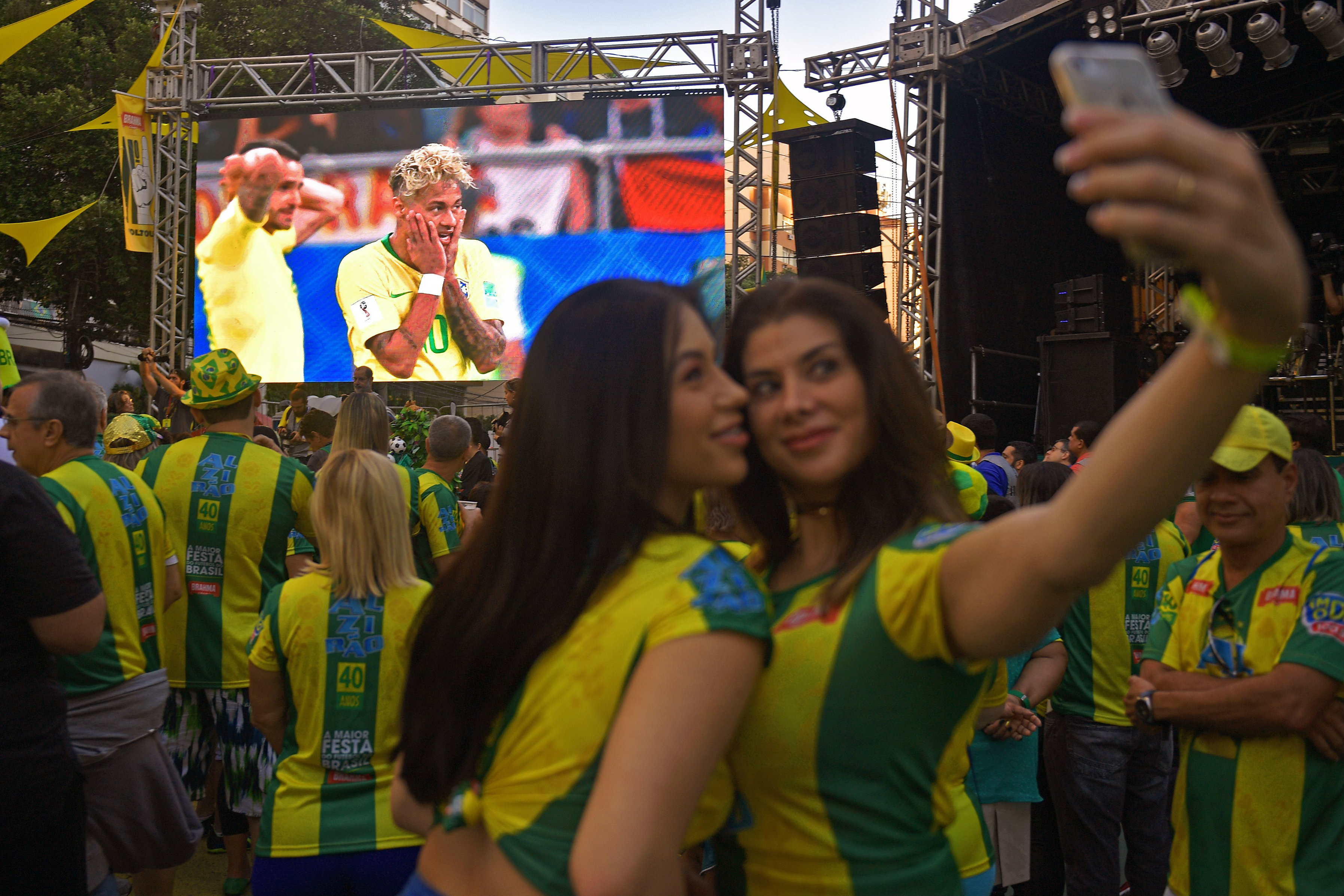 A couple of Brazil fans take a selfie at one of the FIFA Fan Fests.