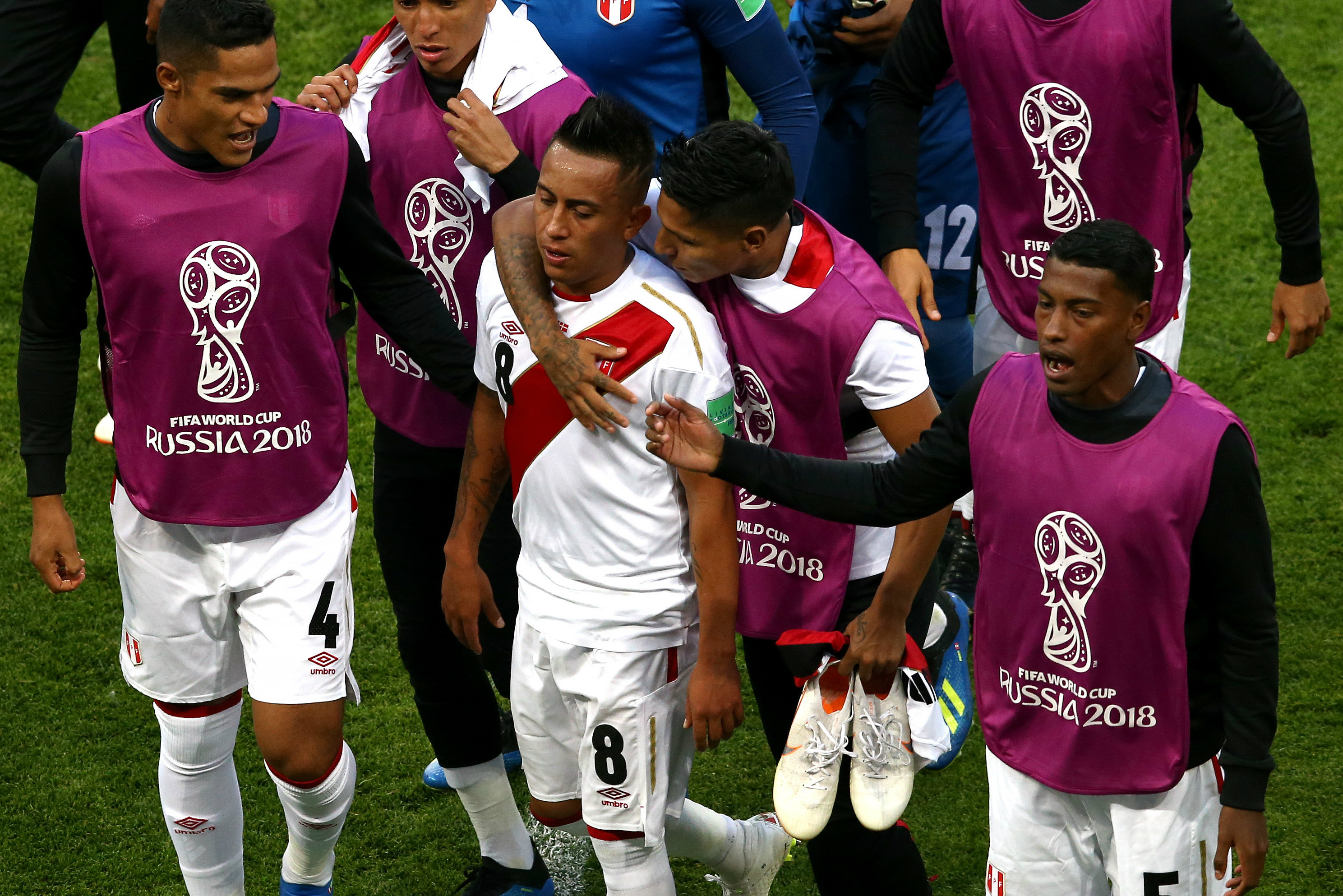 Peru players console Christian Cueva after his penalty miss Peru players console Christian Cueva after his penalty miss