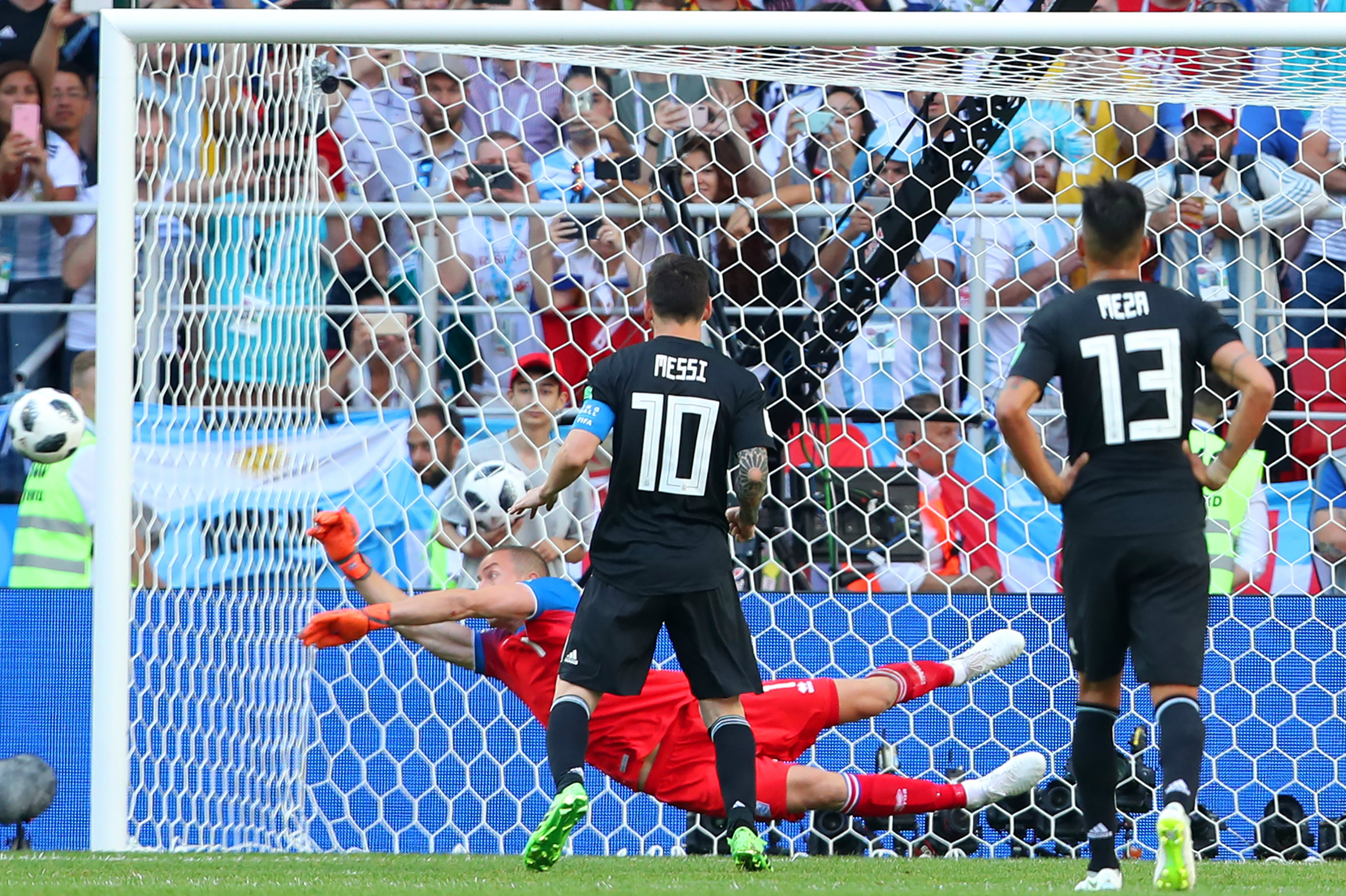 Iceland keeper Hannes Thor Halldorsson denies Lionel Messi's penalty. Iceland keeper Hannes Thor Halldorsson denies Lionel Messi's penalty.