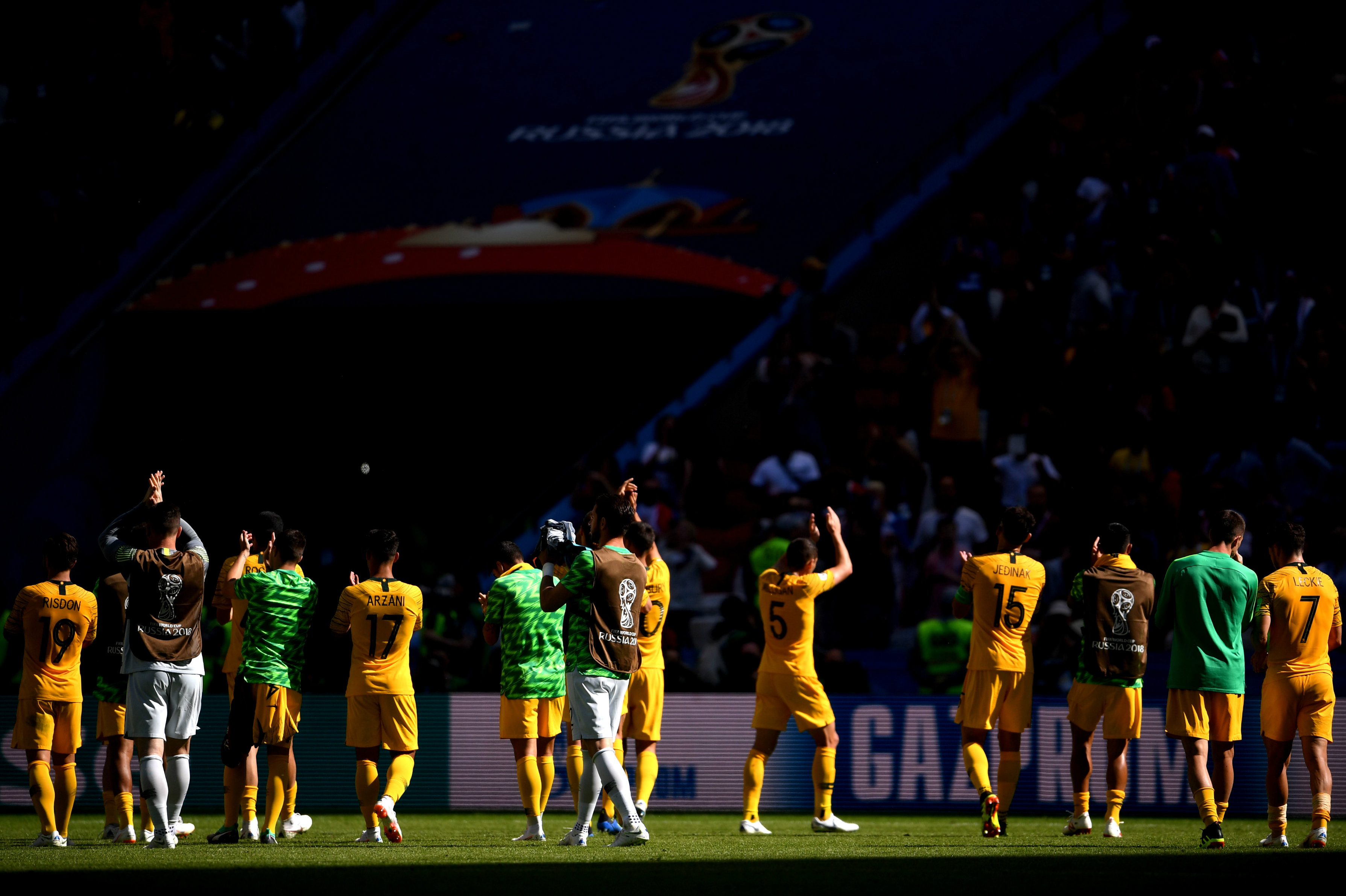 Socceroos players thank the fans for their support inside the Kazan Arena. Socceroos players thank the fans for their support inside the Kazan Arena.