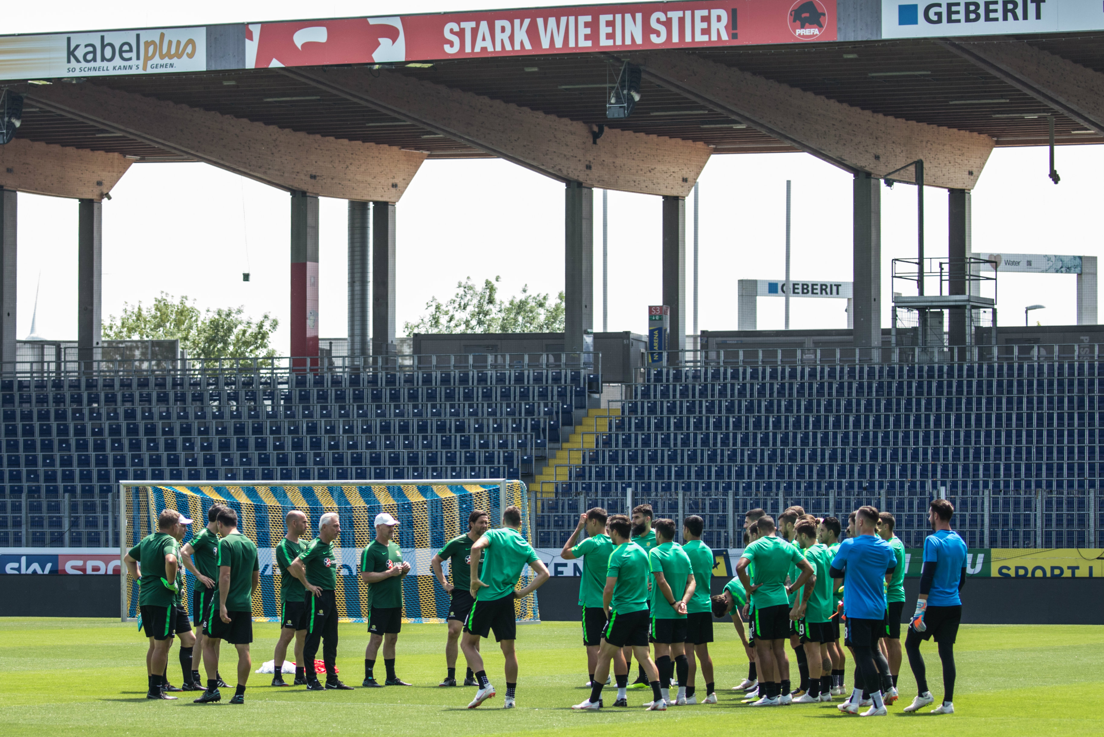Bert van Marwijk issues some instructions to the players. Bert van Marwijk issues some instructions to the players.