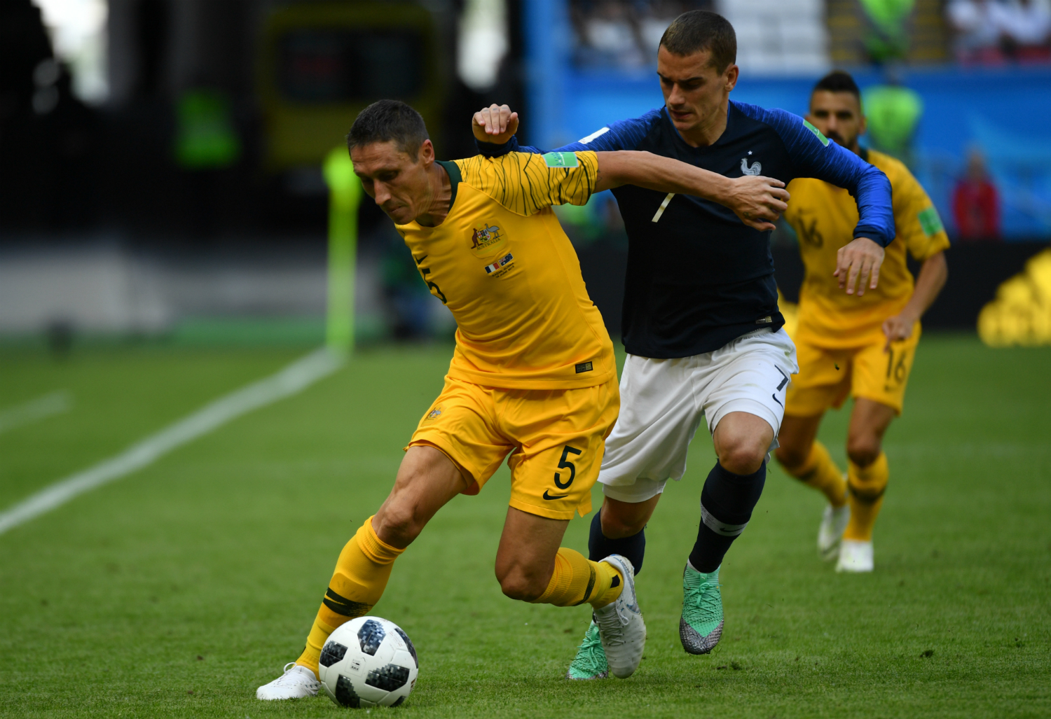 Mark Milligan and Antoine Griezmann Mark Milligan and Antoine Griezmann