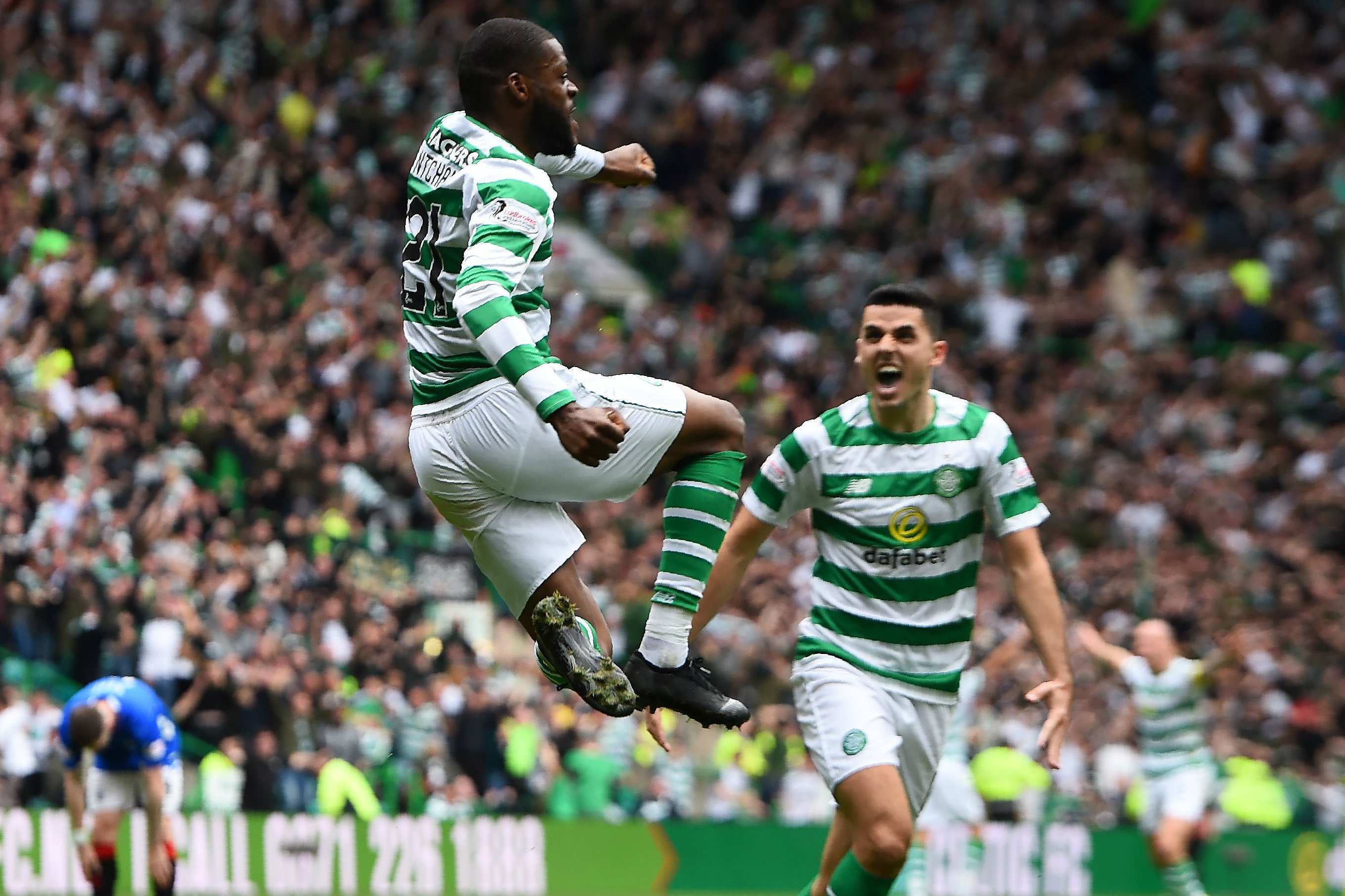 Tom Rogic celebrates Olivier Ntcham's goal.