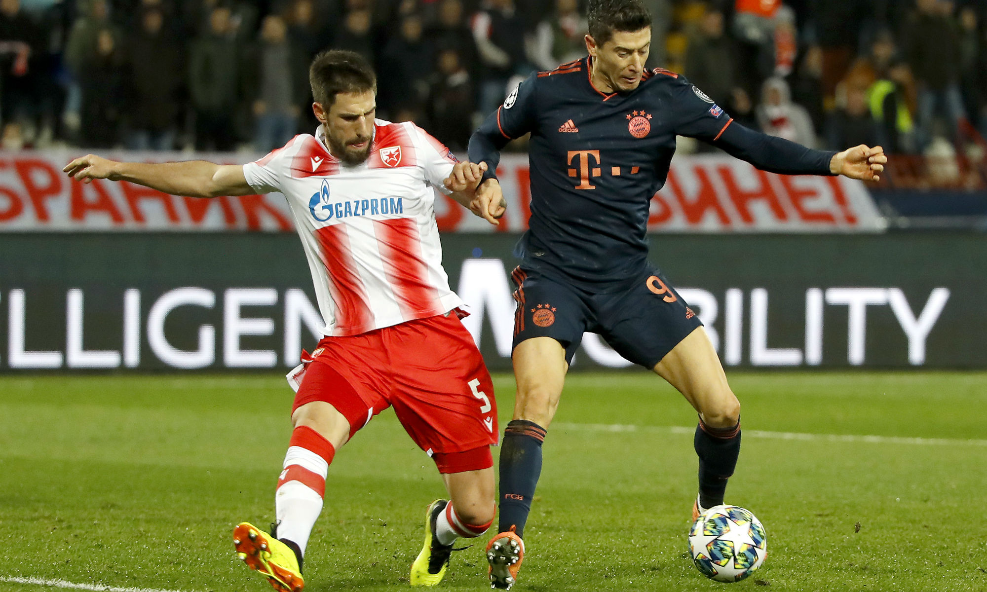 Milos Degenek closes down Robert Lewandowski in the UEFA Champions League.