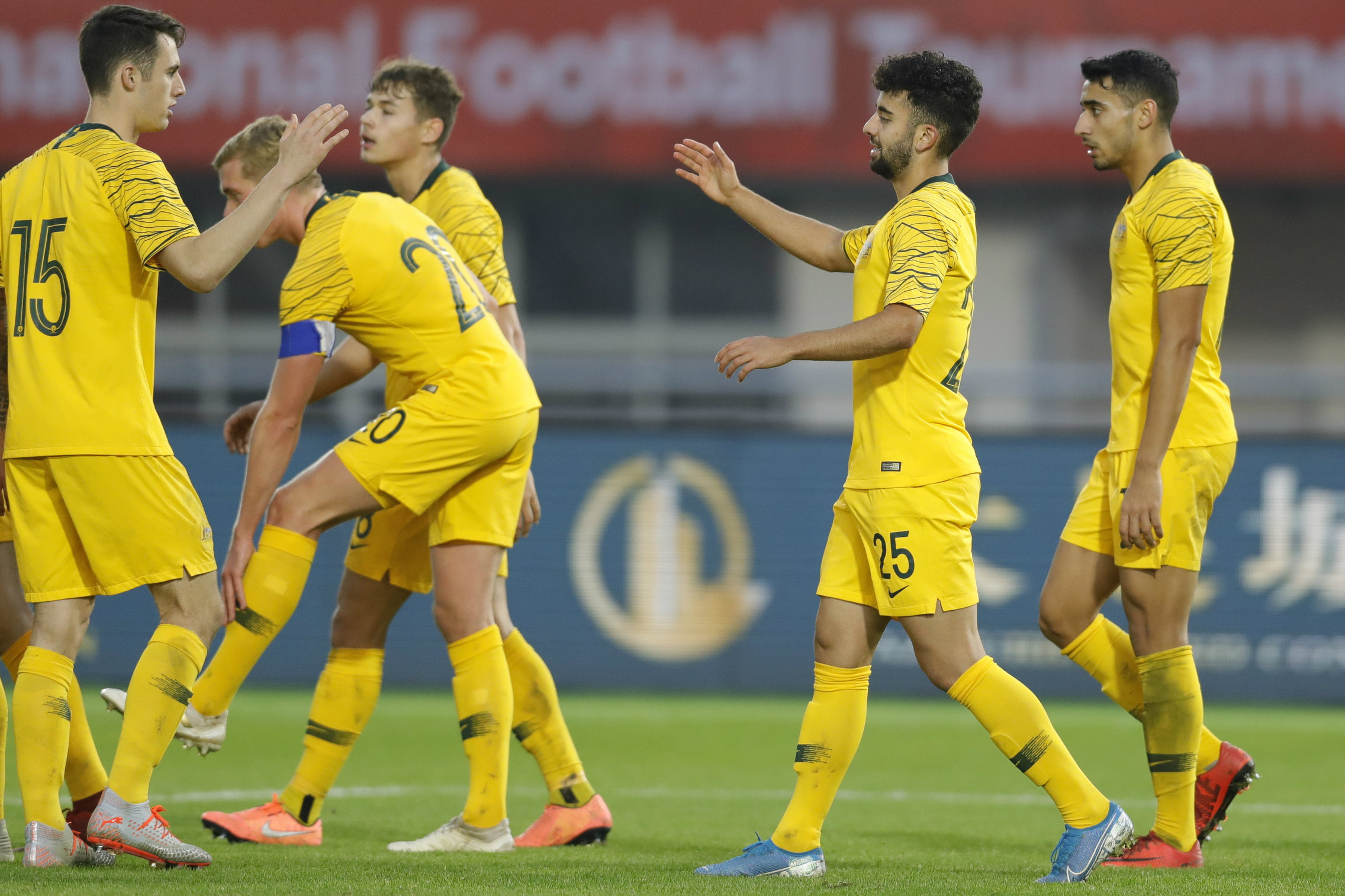 The Australians celebrate Ramy Najjarine's goal against Lithuania