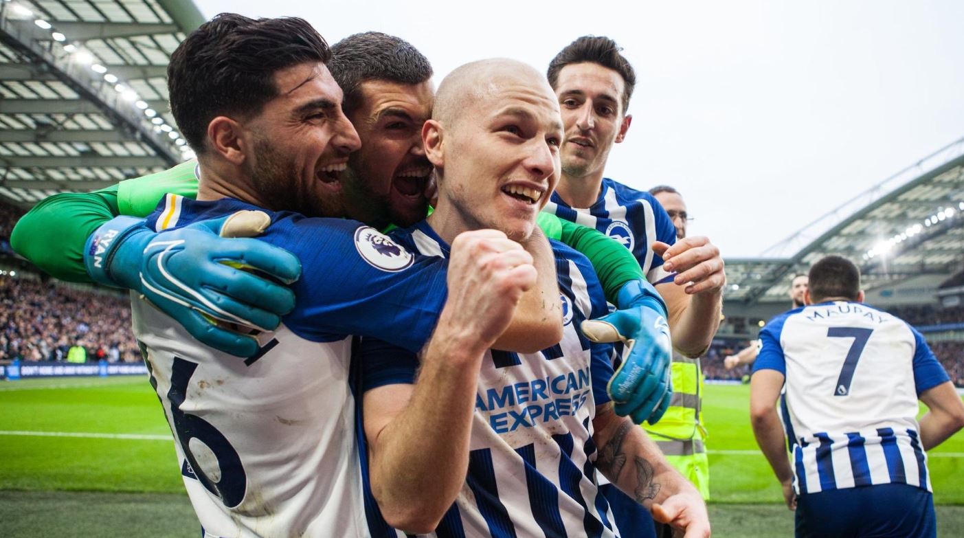 Mat Ryan, Aaron Mooy celebrate Brighton goal