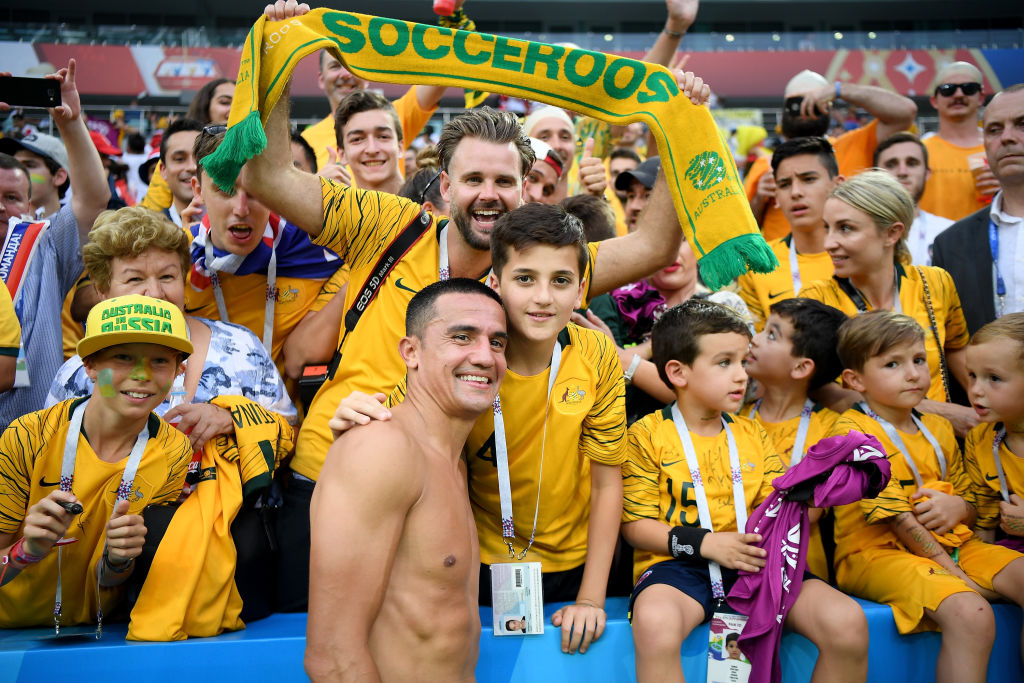 Cahill with his son after the Peru game in Russia