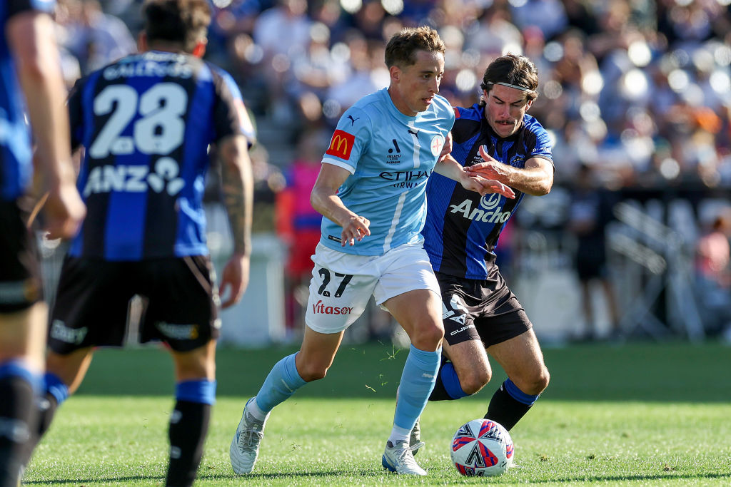 AUCKLAND, NEW ZEALAND - JANUARY 18: Kai Trewin of Melbourne City is challenged by Liam Gillion of Auckland during the round 15 A-League Men match between Auckland FC and Melbourne City at Go Media Stadium, on January 18, 2025, in Auckland, New Zealand. (Photo by Dave Rowland/Getty Images)