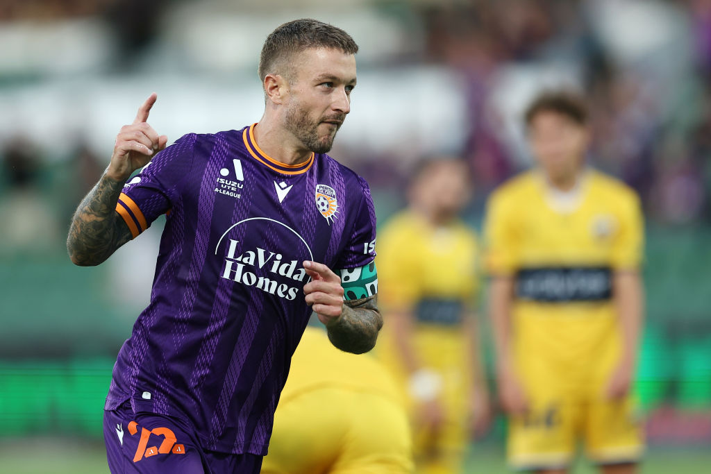 PERTH, AUSTRALIA - FEBRUARY 07: Adam Taggart of Perth Glory celebrates with team mates after scoring a goal during the round 18 A-League Men match between Perth Glory and Central Coast Mariners at HBF Park, on February 07, 2025, in Perth, Australia. (Photo by Will Russell/Getty Images)