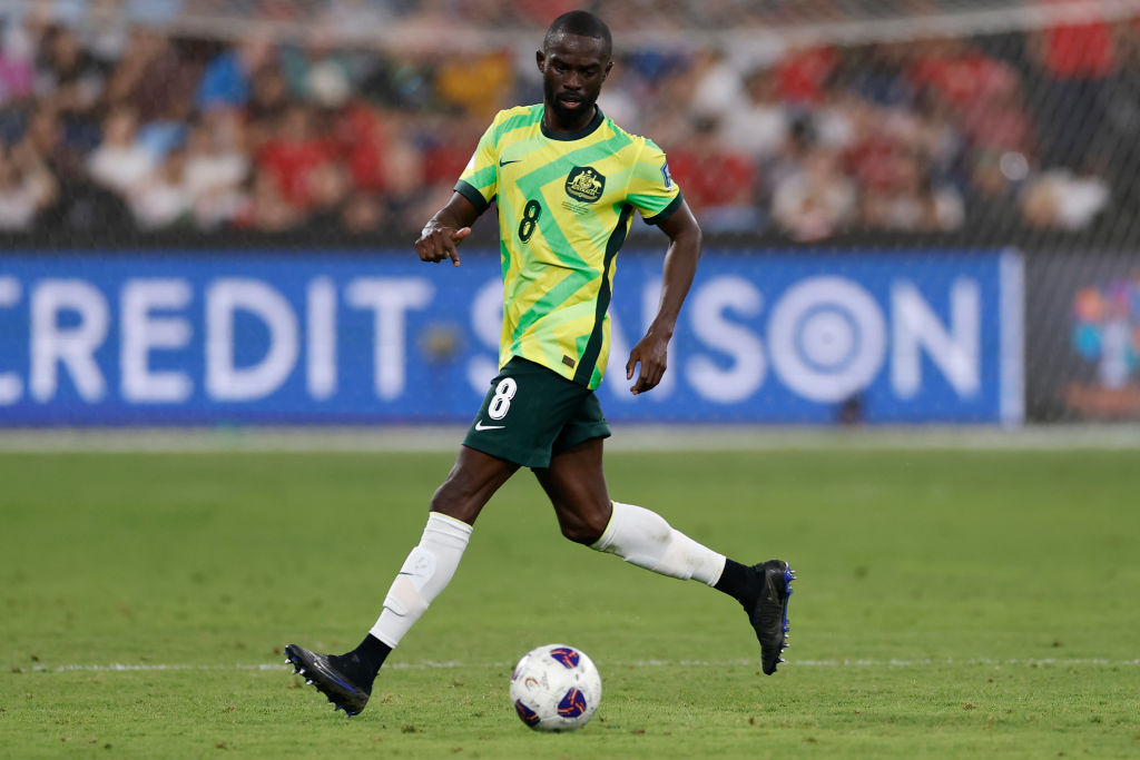 SYDNEY, AUSTRALIA - MARCH 20: Jason Geria of Australia runs with the ball during the round three FIFA 2026 World Cup AFC Asian Qualifier match between Australia Socceroos and Indonesia at Allianz Stadium on March 20, 2025 in Sydney, Australia. (Photo by Darrian Traynor/Getty Images)