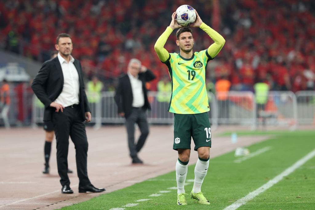 HANGZHOU, CHINA - MARCH 25: Fran Karacic of Australia throws in during the FIFA World Cup Asian Qualifiers Group C match between China and Australia at Hangzhou Olympic Sports Centre Stadium on March 25, 2025 in Hangzhou, China. (Photo by Lintao Zhang/Getty Images)