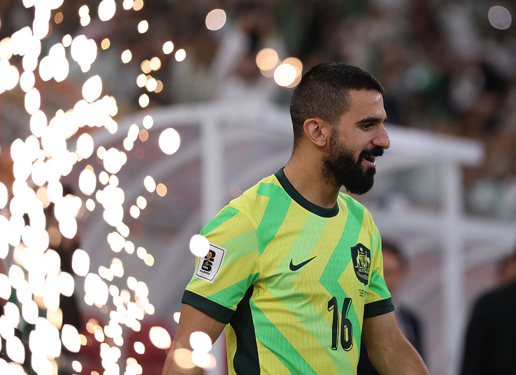 JEDDAH, SAUDI ARABIA - JUNE 10: Aziz Behich of the Socceroos walks out during the 2026 FIFA World Cup Round Three AFC Asian Qualifier match between Saudi Arabia and Australia Socceroos at King Abdullah Sports City on June 10, 2025 in Jeddah, Saudi Arabia. (Photo by Robert Cianflone/Getty Images)