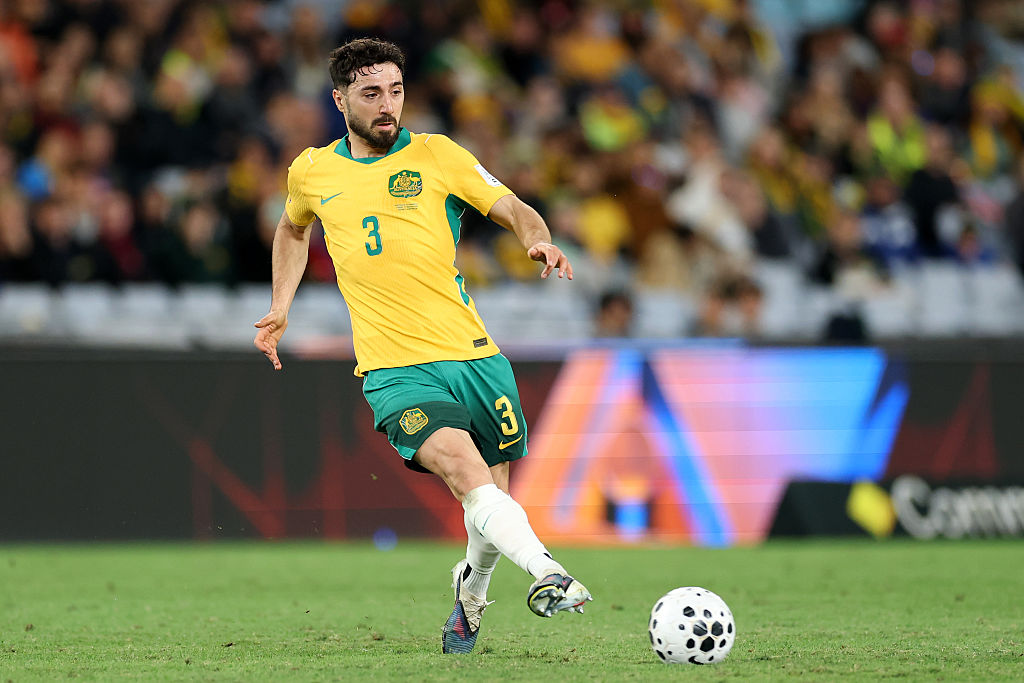 SYDNEY, AUSTRALIA - MARCH 27: Jacob Italiano of Australia kicks the ball during the FIFA Series match between Australia and Cameroon at Stadium Australia on March 27, 2026 in Sydney, Australia (Photo by Darrian Traynor/Getty Images)