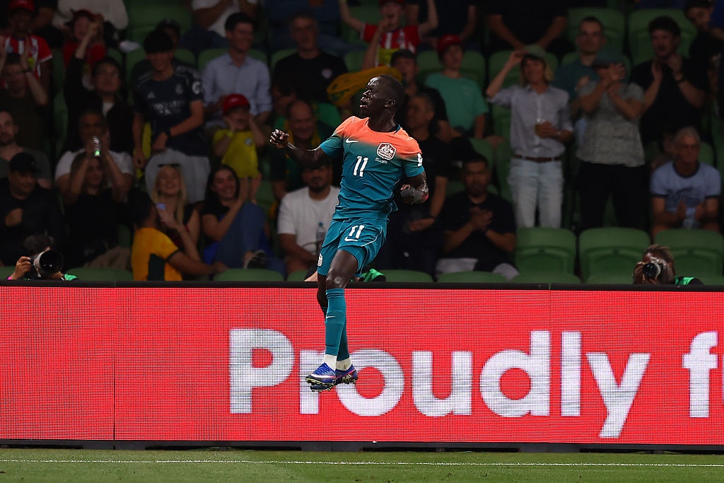 MELBOURNE, AUSTRALIA - MARCH 31: Awer Mabil of Australia celebrates scoring a goal during the FIFA Series match between Australia Socceroos and Curacao at AAMI Park on March 31, 2026 in Melbourne, Australia. (Photo by Graham Denholm/Getty Images)