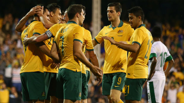 Massimo Luongo among Socceroos congratulating Bailey Wright on his maiden international goal.