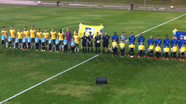 The Young Socceroos and Brazil U-20's before kick-off at WIN Stadium.