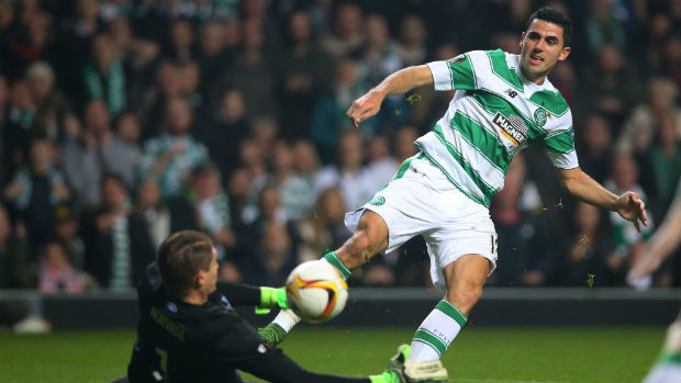 Tom Rogic has a shot on goal for Celtic in the Europa League.