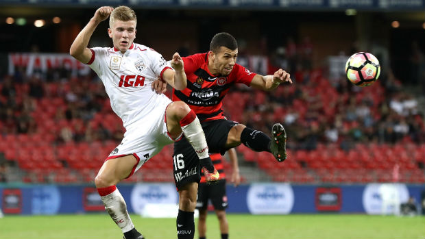 Riley McGree challenges Jaushua Sotirio for the ball at Spotless Stadium.