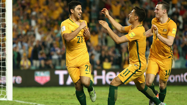 Massimo Luongo celebrates after scoring against Jordan.