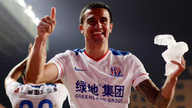 Tim Cahill celebrates a Shanghai Shenhua win earlier in the season.