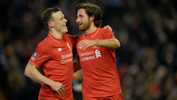 Brad Smith and Joe Allen celebrate combining to score Liverpool's first goal in their FA Cup win over Exeter City.