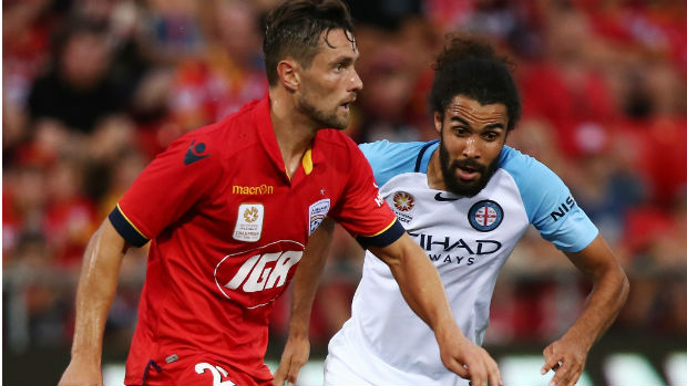 James Holland on the ball for the Reds at Coopers Stadium on Thursday night.