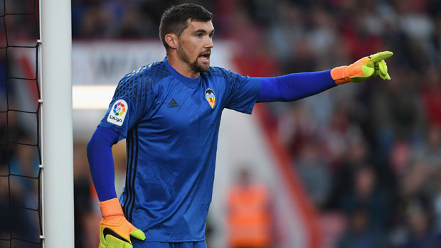 Caltex Socceroo Mat Ryan barks instructions to his Valencia defence during the friendly against AFC Bournemouth.