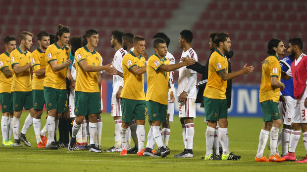 The Olyroos and UAE shake hands at full-time in Doha.
