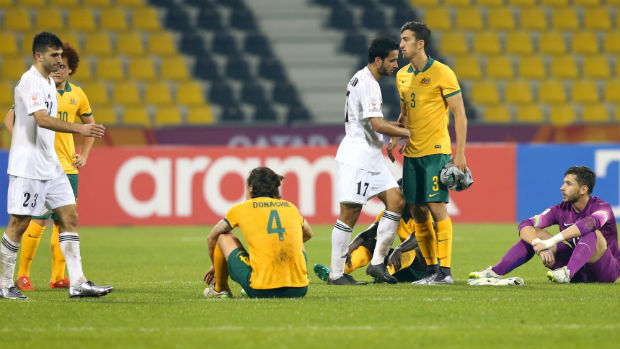 A disappointed Olyroos side shake hands with Jordan at full-time at the AFC U-23 Championship.