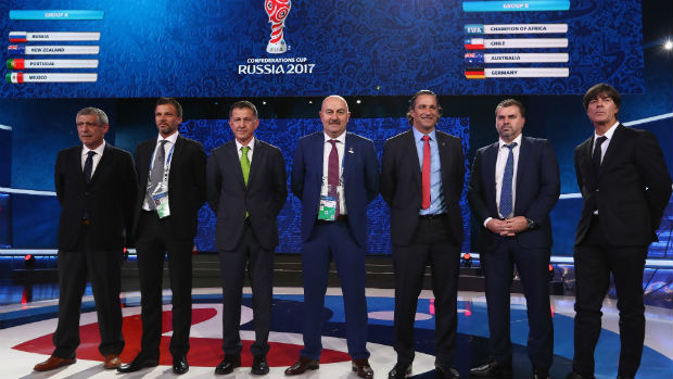 Caltex Socceroos boss Ange Postecoglou alondside fellow coaches at the 2018 Confederations Cup draw in Russia.