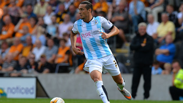 Jason Davidson surges forward during his time at Huddersfield.