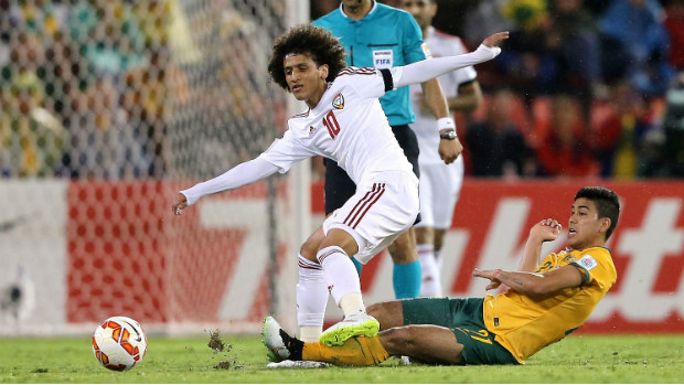 Massimo Luongo tries to dispossess UAE star Omar Abdulrahman during the contest.