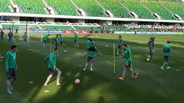 Socceroos players maintain possession during a training session in Perth.