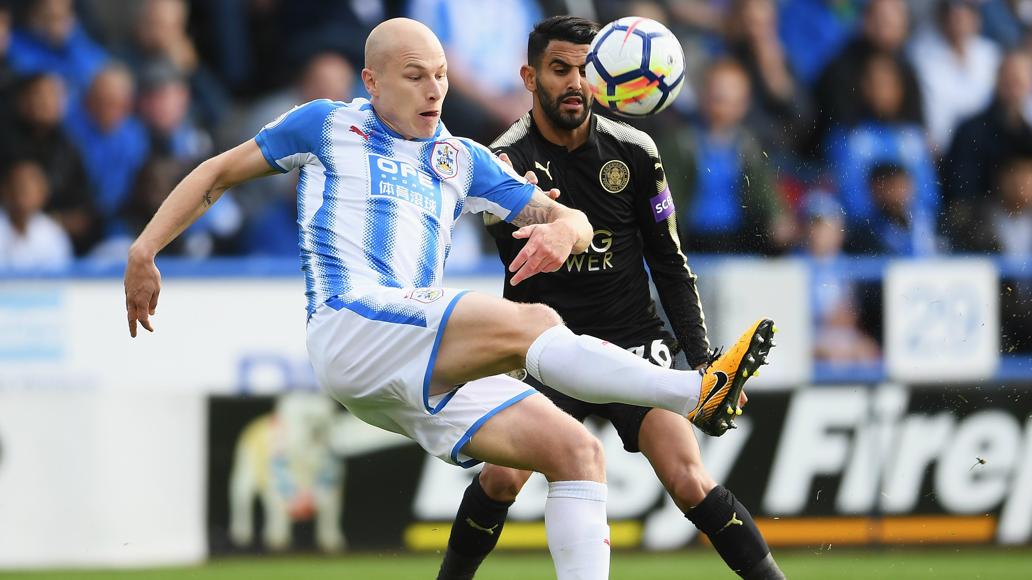 Aaron Mooy - pictured here under pressure from Riyadh Mahrez - was superb in Huddersfield's 1-1 draw with Leicester City.