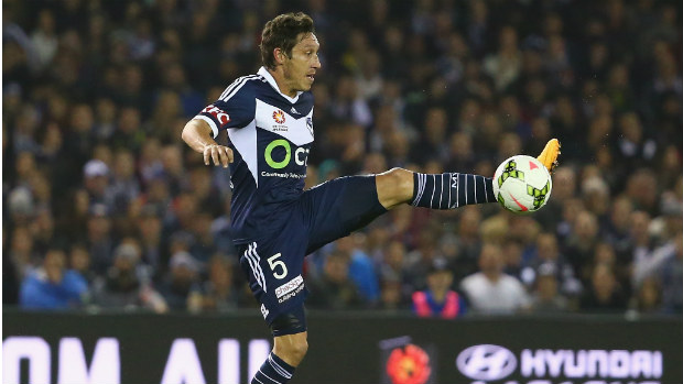 Victory skipper Mark Milligan brings the ball under control at Etihad Stadium.