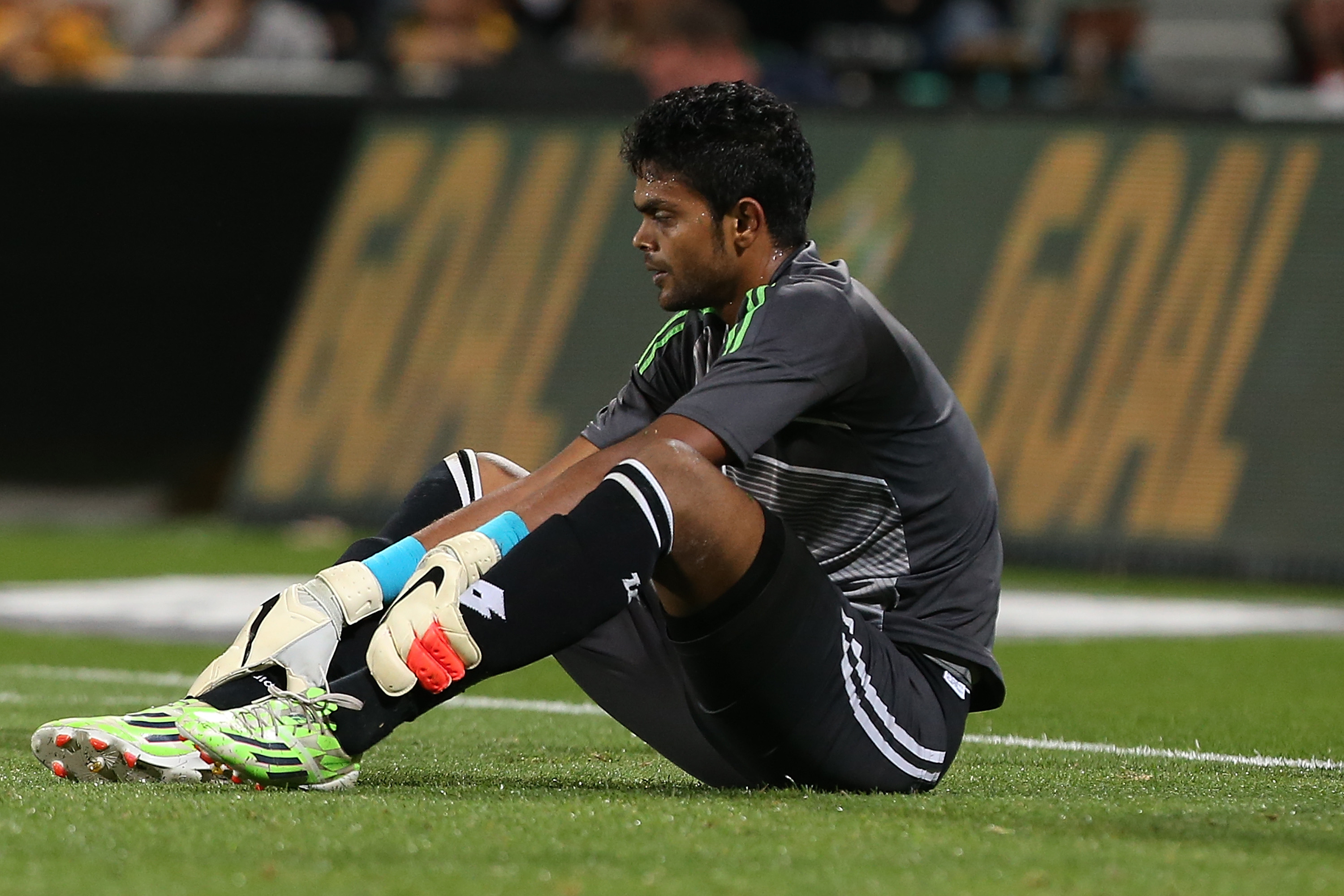 Bangladeshi keeper Alam Sahidul looks on after conceding a fourth goal inside the first half.