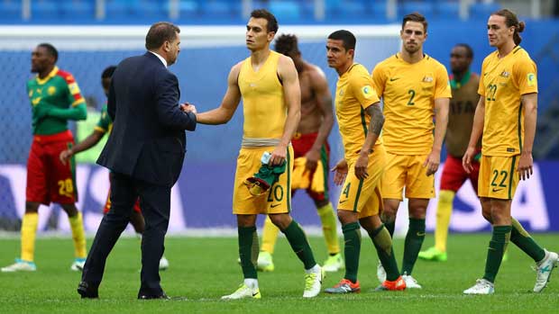 Ange Postecoglou congratulates his players after the 1-1 draw against Cameroon at the FIFA Confederations Cup.
