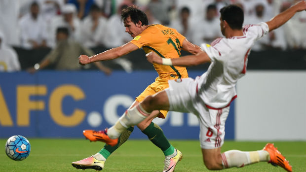 Robbie Kruse has a shot at goal in Australia's WCQ against UAE in Abu Dhabi.