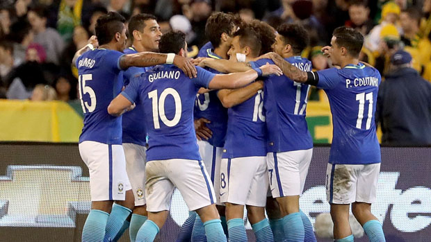 Brazil players celebrate a goal in their win over the Caltex Socceroos.