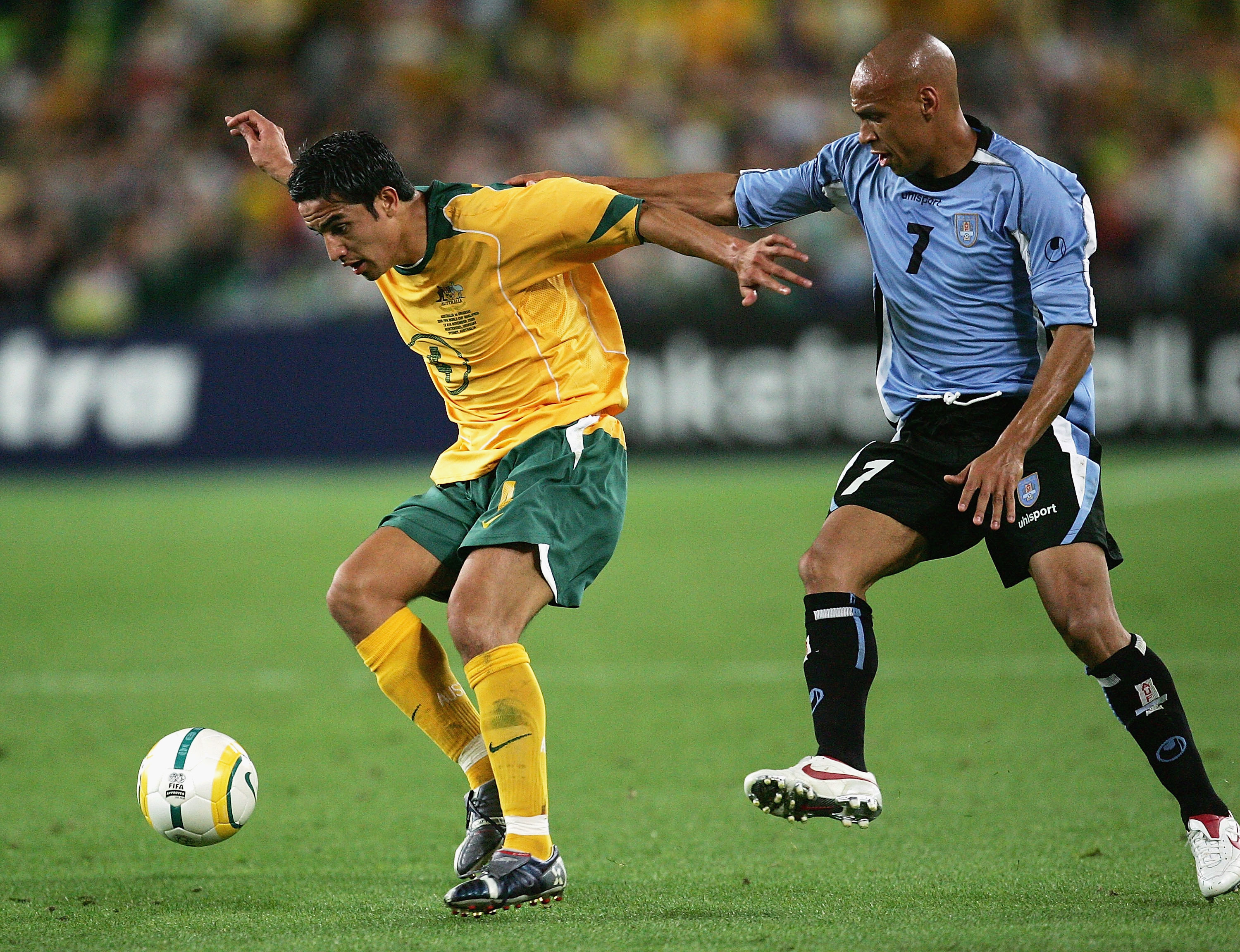 A fresh-faced Tim Cahill started as Australia absorbed a series of Uruguayan attacking raids in the opening 20 minutes.